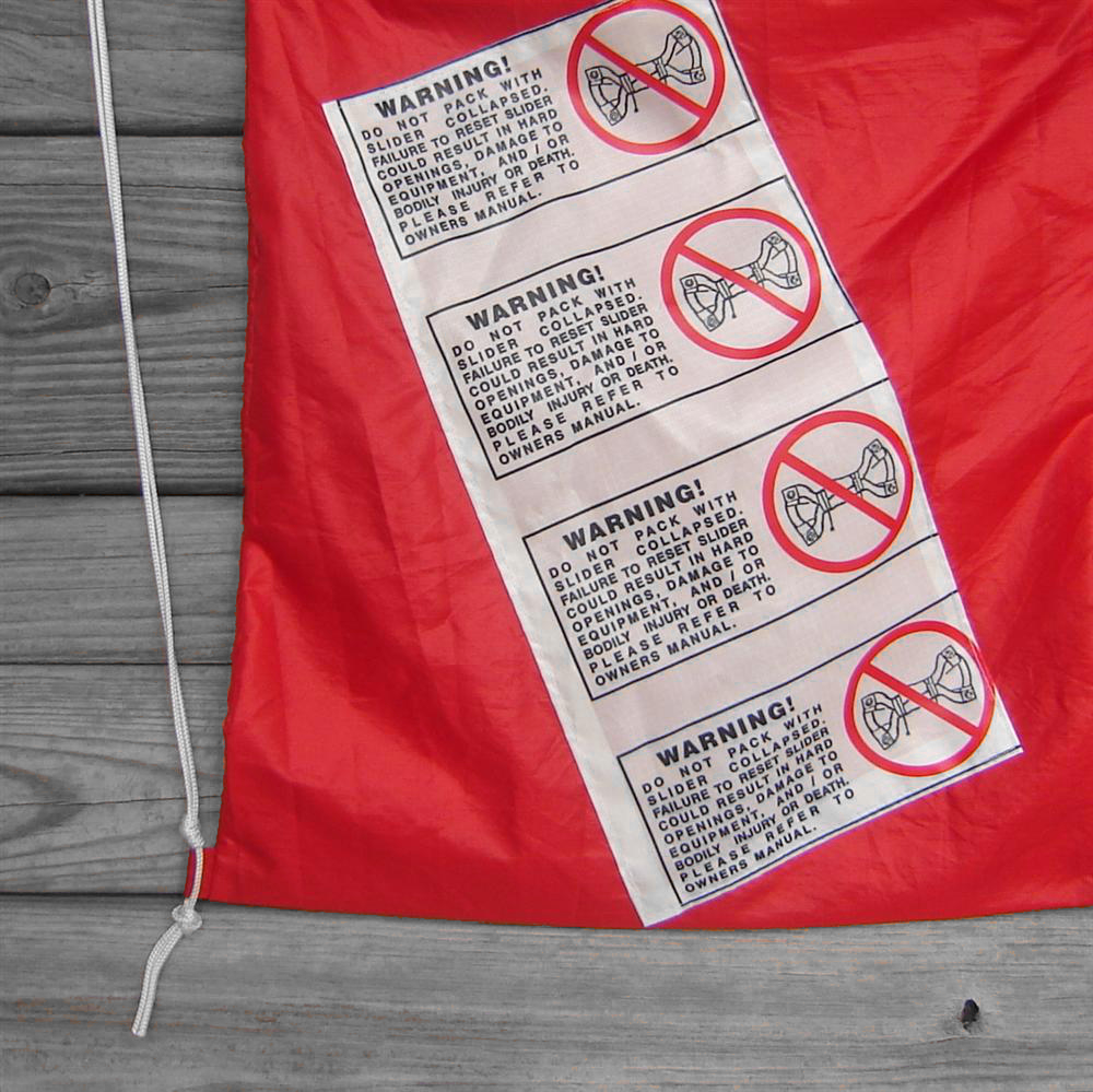 Red Upcycled Parachute Drawstring Backpack Warning Labels