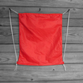 Load image into Gallery viewer, Red Upcycled Parachute Drawstring Backpack Warning Labels
