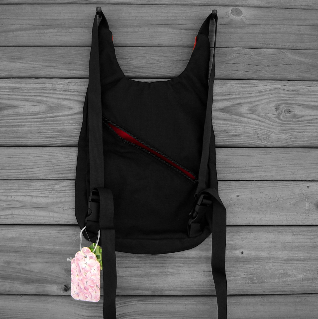 Red and Black Cordura Nylon Backpack with Partial Silhouette Logo
