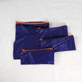 Load image into Gallery viewer, Four Purple Silky Ripstop Zipper Pouches with Orange YKK Zippers
