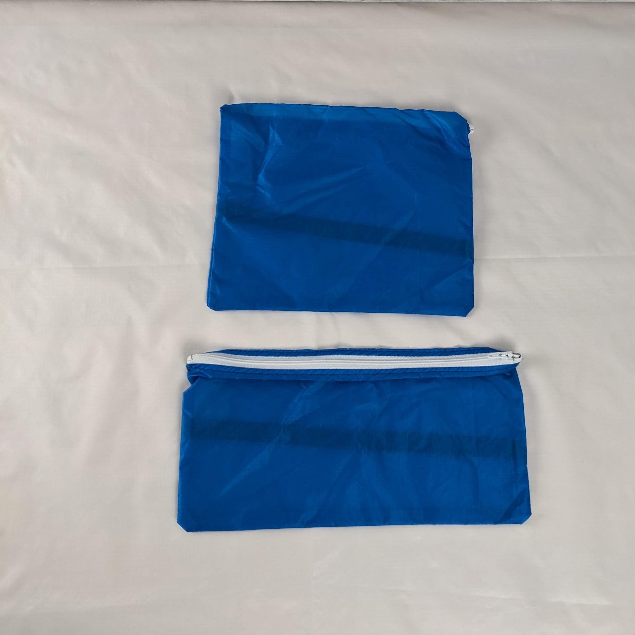 Two Water Resistant Marine Blue Zipper Pouches