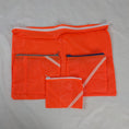 Load image into Gallery viewer, Four Repurposed Orange Zero Porosity Parachute Zipper Pouches
