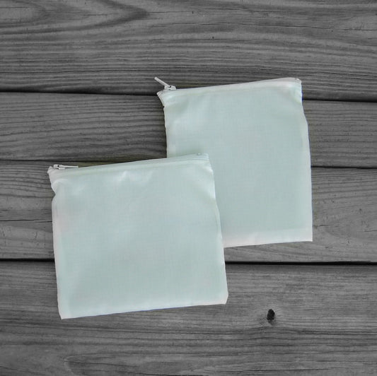 Two Silky White Ripstop Zipper Pouches with ABC Ribbon and White Zippers