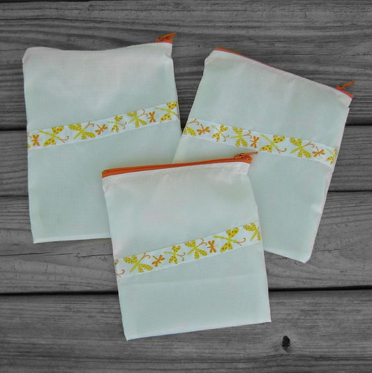 Three Silky White Ripstop Zipper Pouches with Dragonfly Ribbon and Orange Zippers